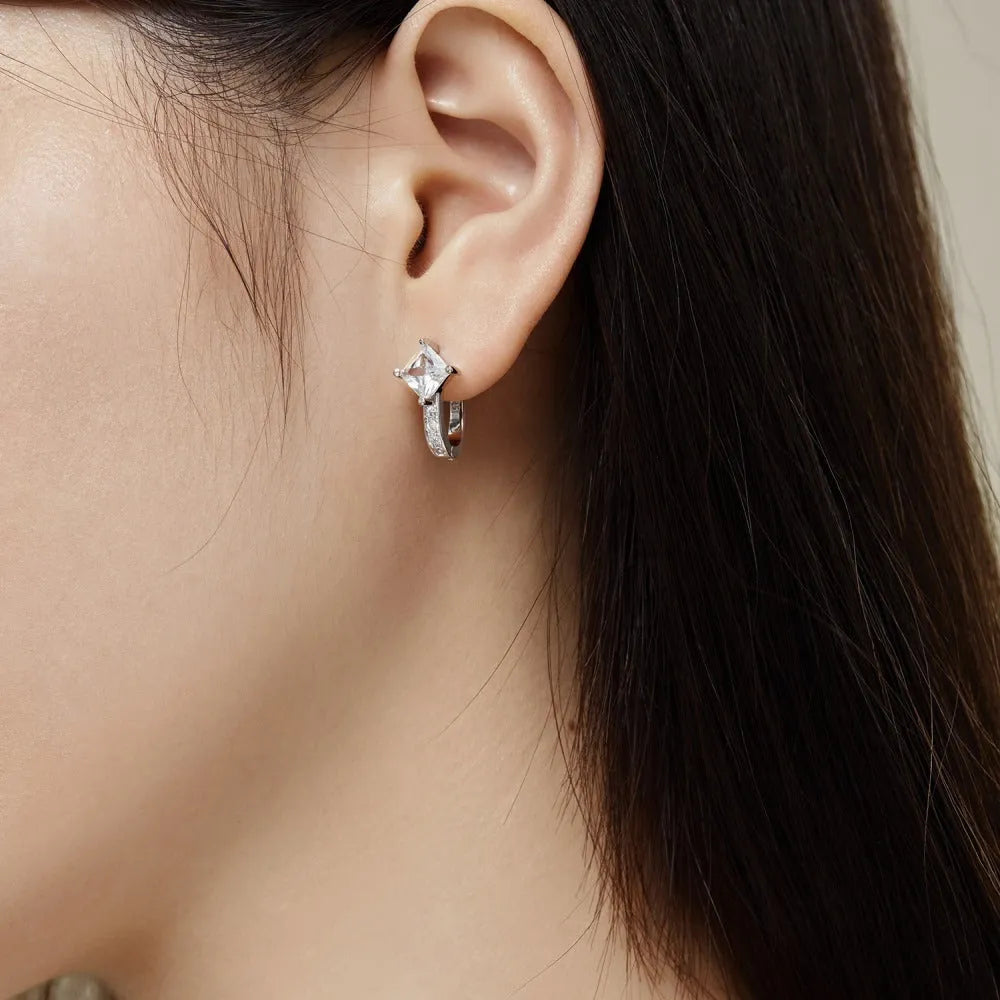 Pair of U-shaped zircon stud earrings in platinum white diamond colour on 925 silver, 10x14.5x17.5mm