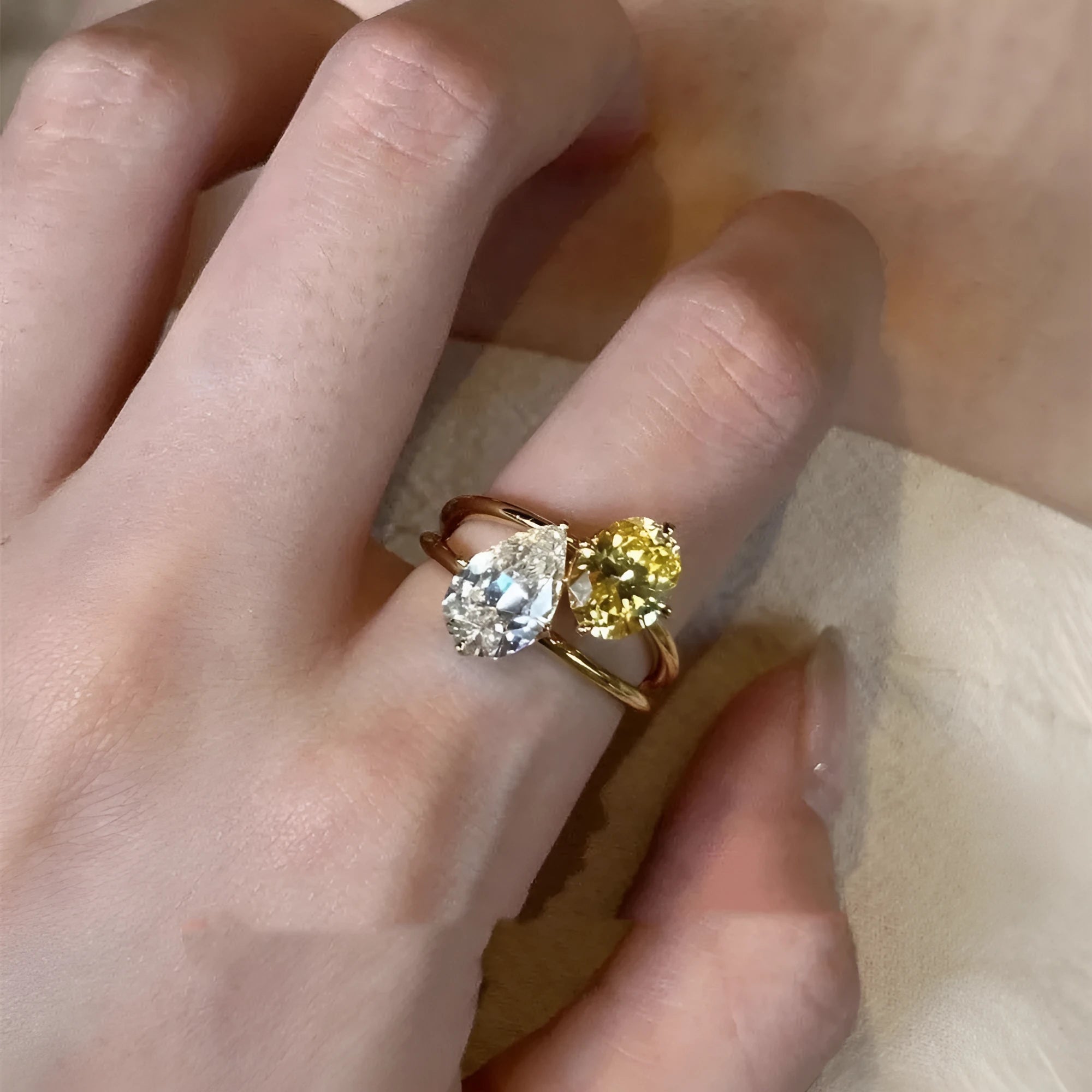 Copper geometric open ring for women with a water drop double Sheng stone.