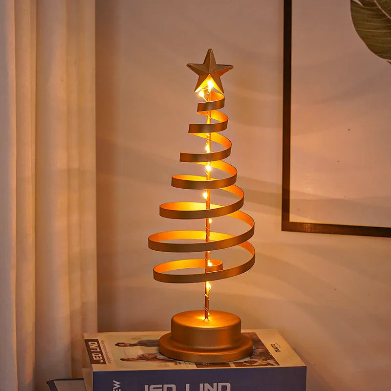 33cm tall metal LED Christmas tree ornament with warm white lights on tabletop