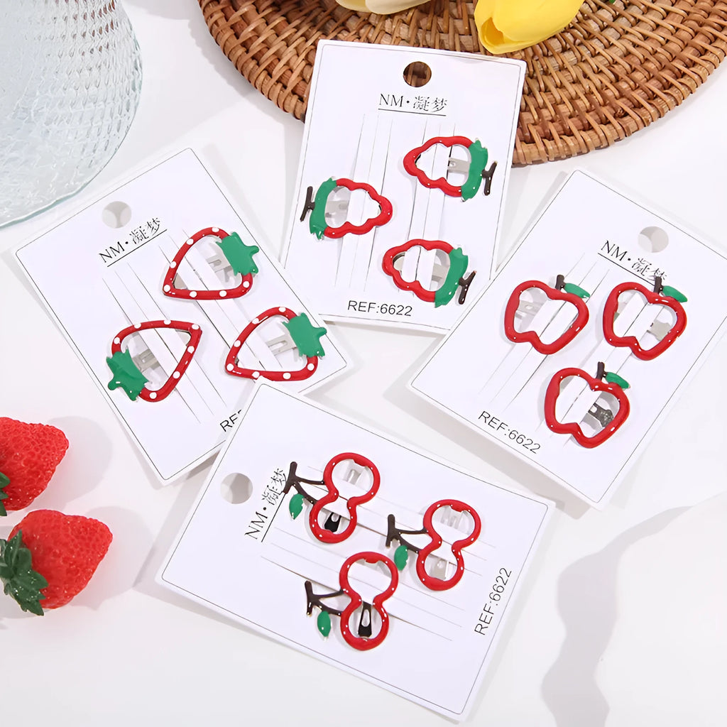 Children's cartoon fruit hair clips in plastic with cherry, apple and strawberry barrette designs