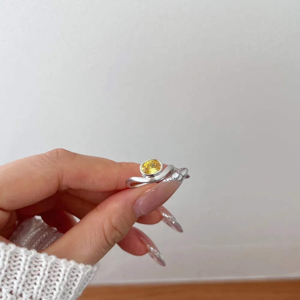 Women's simple oval silver ring electroplated platinum white diamond colour on white background