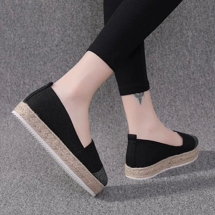 Black and Milky White plus-size canvas oversleeve shoe covers showing round toe design.