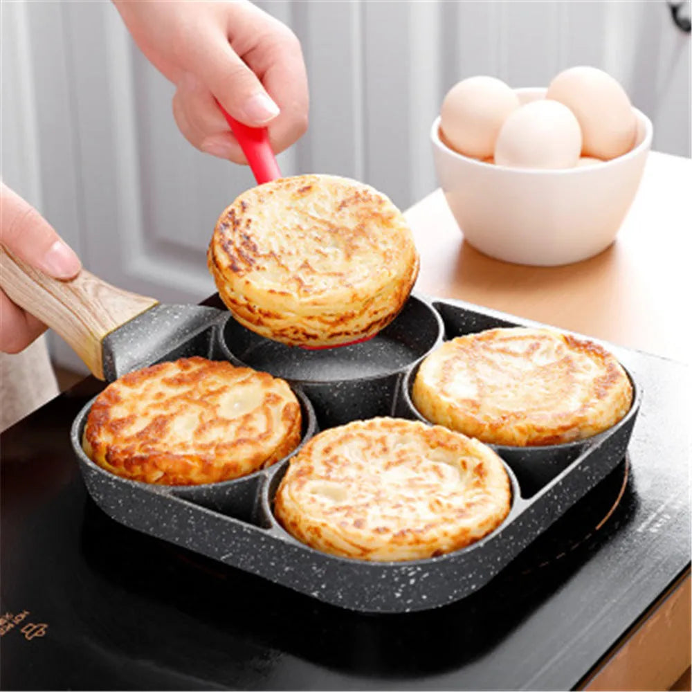 Four-hole non-stick frying pan with medical stone coating and bakelite handle for breakfast cooking