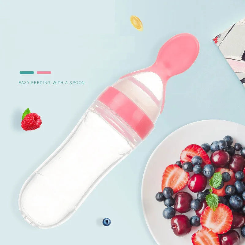 Baby feeding bottle spoon in silicone, 90ml, available in white and pink, with round bottom style