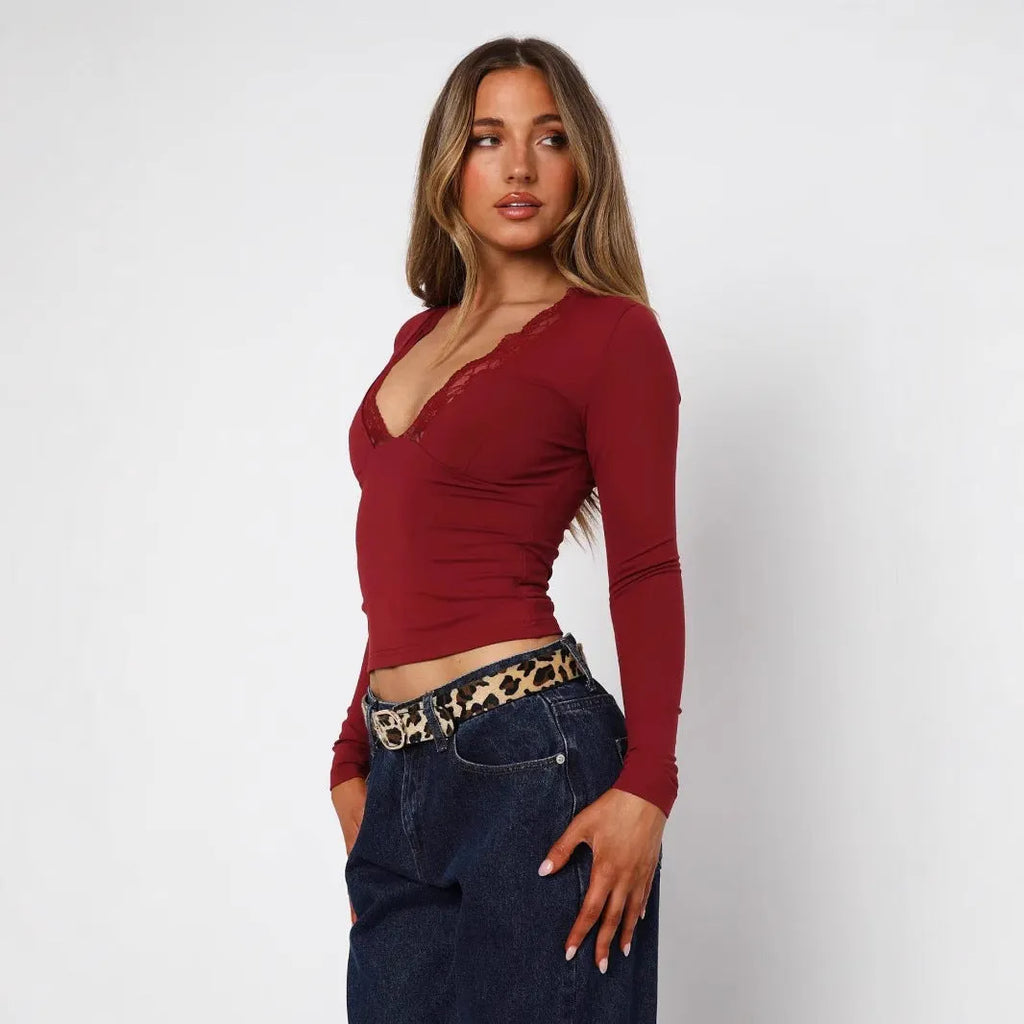 Slim-fit women's blouse with lace flower detailing and long sleeves