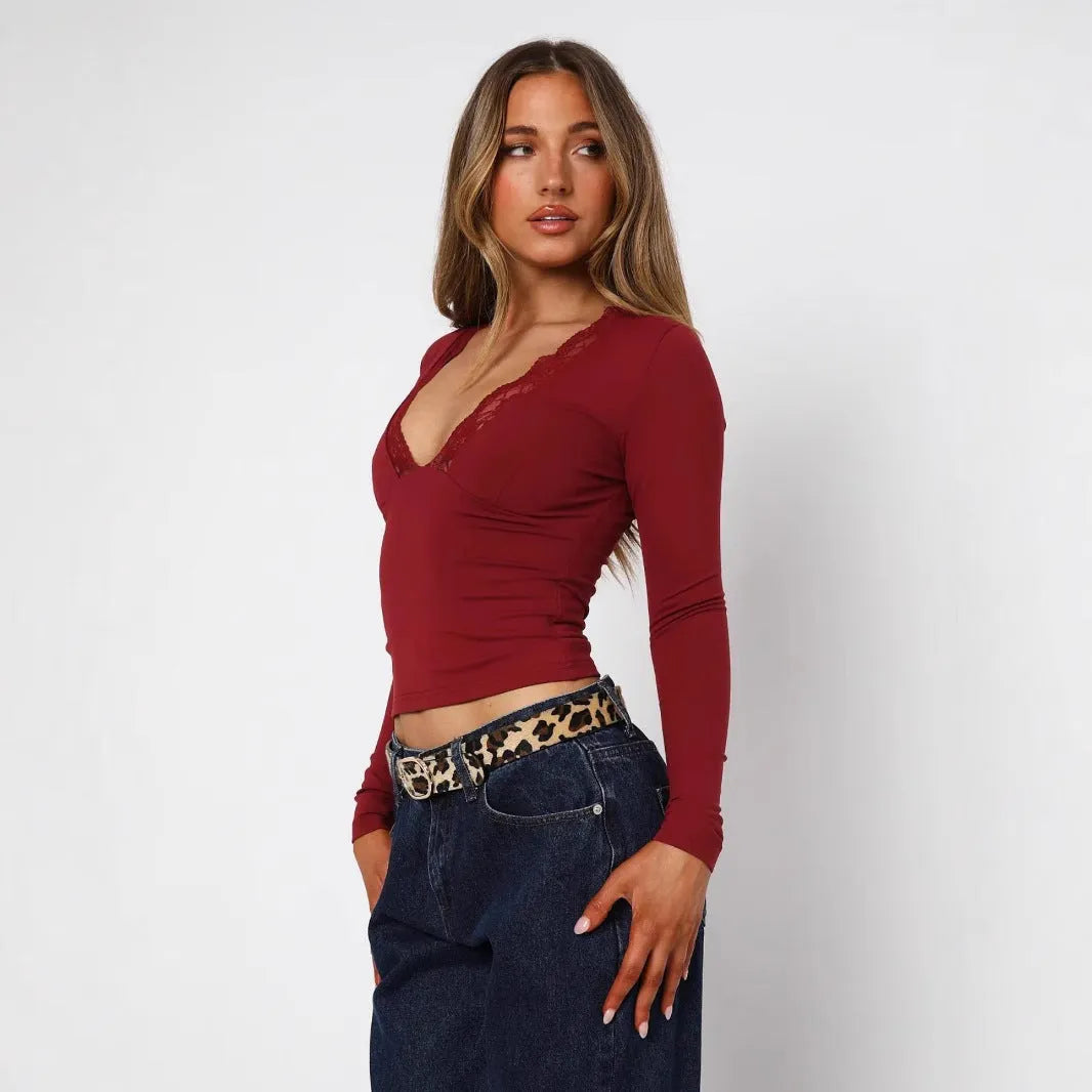 Slim-fit women's blouse with lace flower detailing and long sleeves
