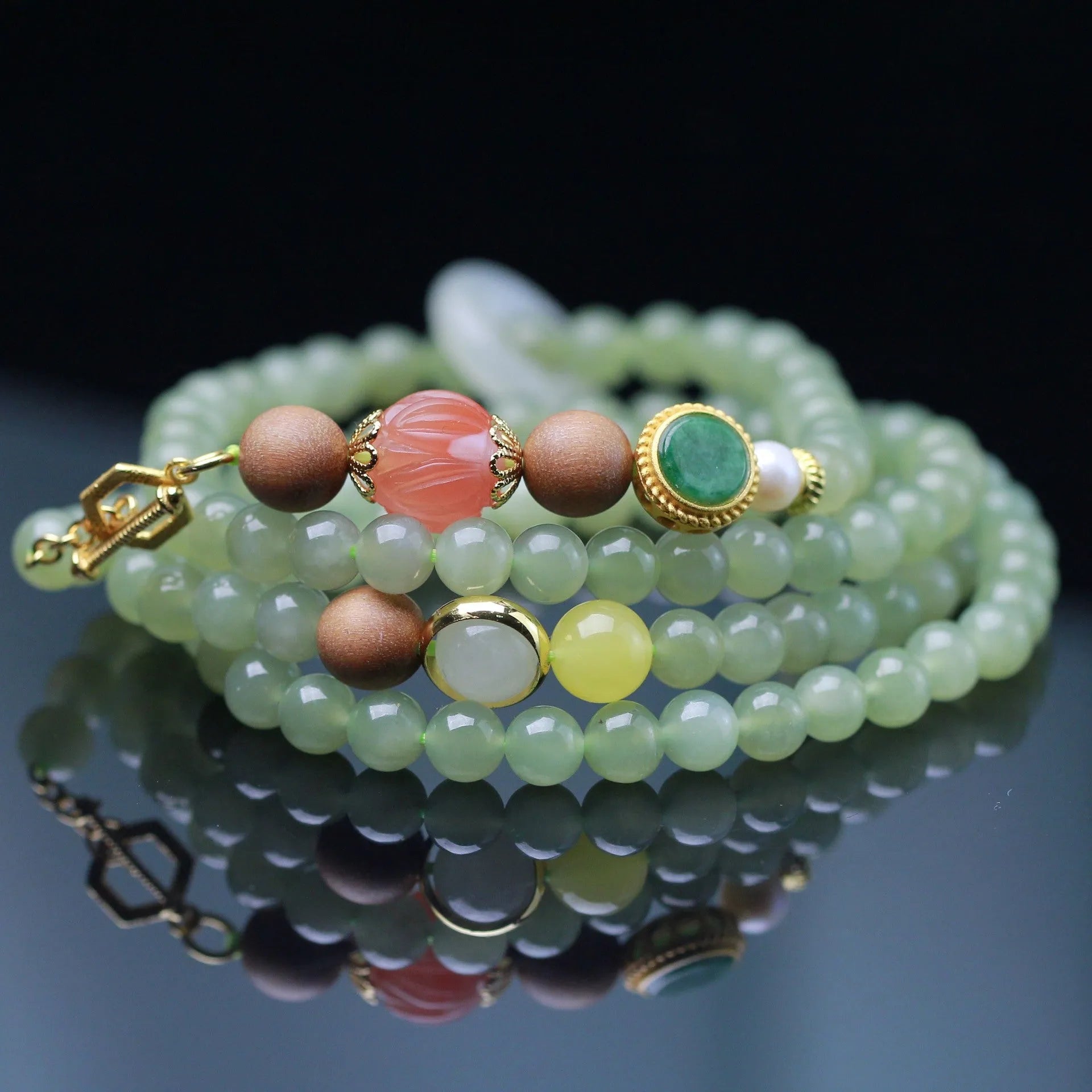 Hetian jade lotus bead necklace with white sandalwood beeswax pendant and fu character charm