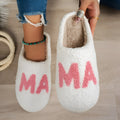 White plush cotton slippers with non-slip TPR sole on indoor floor