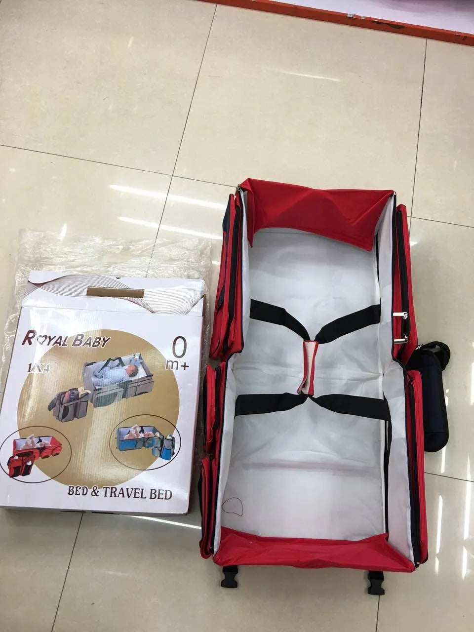 Baby portable travel bed mummy bag in 300D Oxford cloth, foldable design, shown in pink, red, dark blue, gray coffee, beige, gray blue, or coffee.