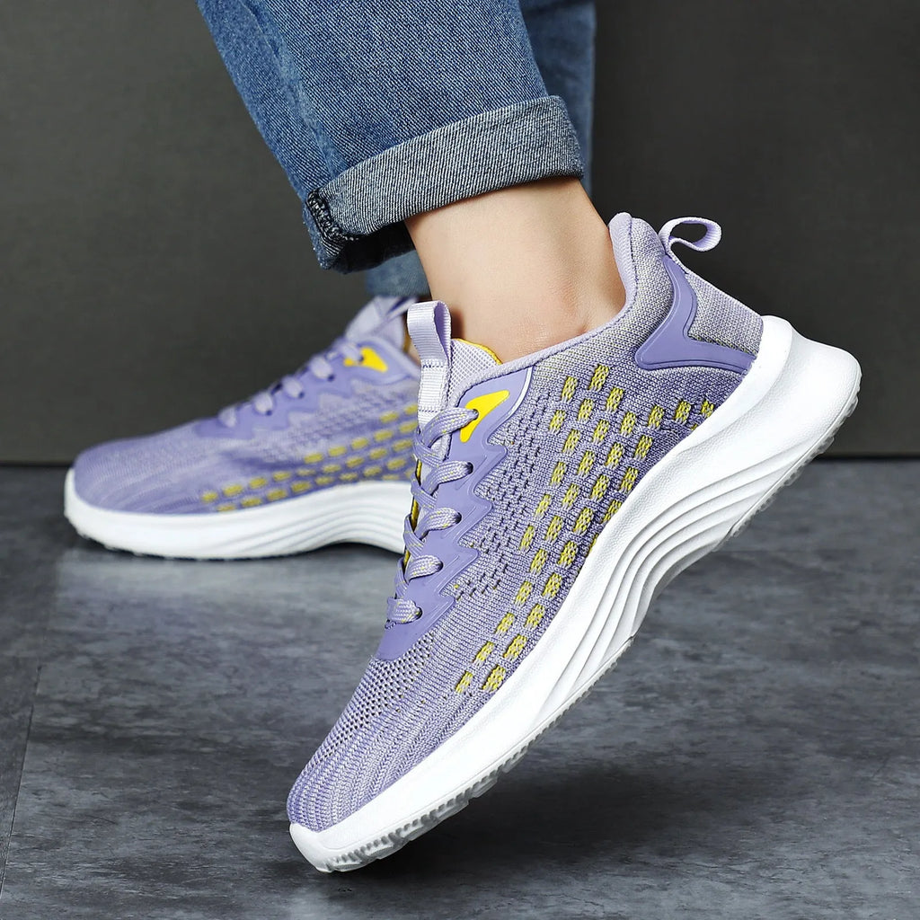Lavender purple women's Flyknit running shoes with mesh upper and striped pattern on an EVA sole.