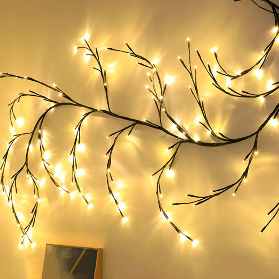 Flexible LED vine light garland with birch bark texture and 144 warm white lights on bendable branches