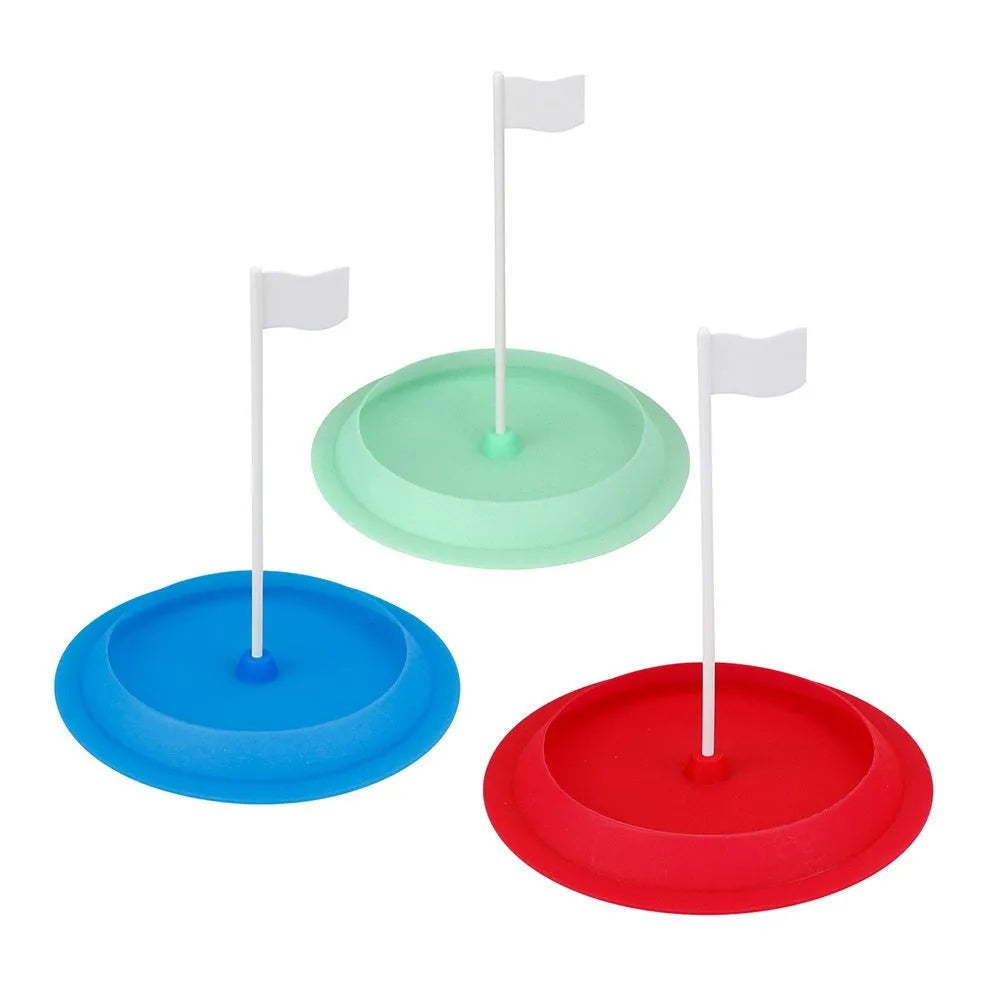 Green silicone putting disc for indoor golf practice measuring 16cm diameter