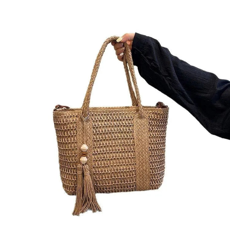 Women's woven straw crossbody shoulder bag in milky white colour with large capacity design