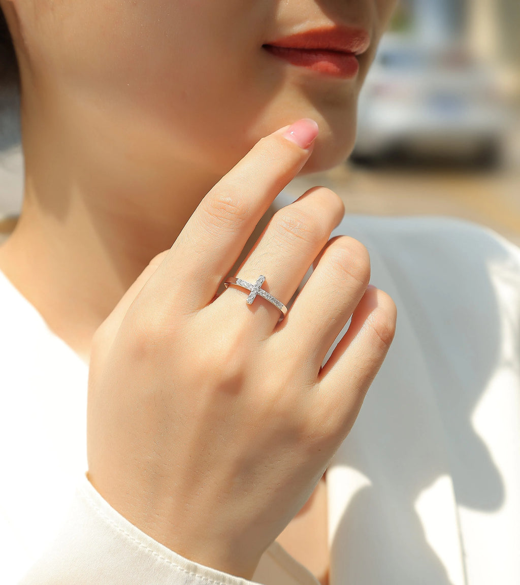 Holy Light Cross moissanite wedding ring set in S925 silver with gold plating on white background