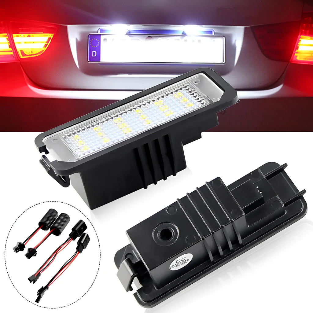 Two Volkswagen LED license plate light bulbs with SMD LEDs and plug connectors.