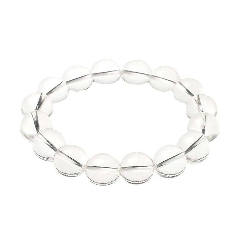 Natural white crystal bracelet with Donghai water round beads showing geometry design on wrist