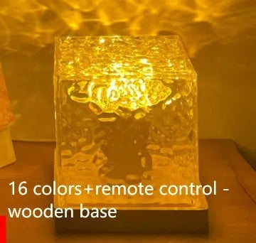 LED water ripple night light with USB cable and remote control creating rotating projection on wall