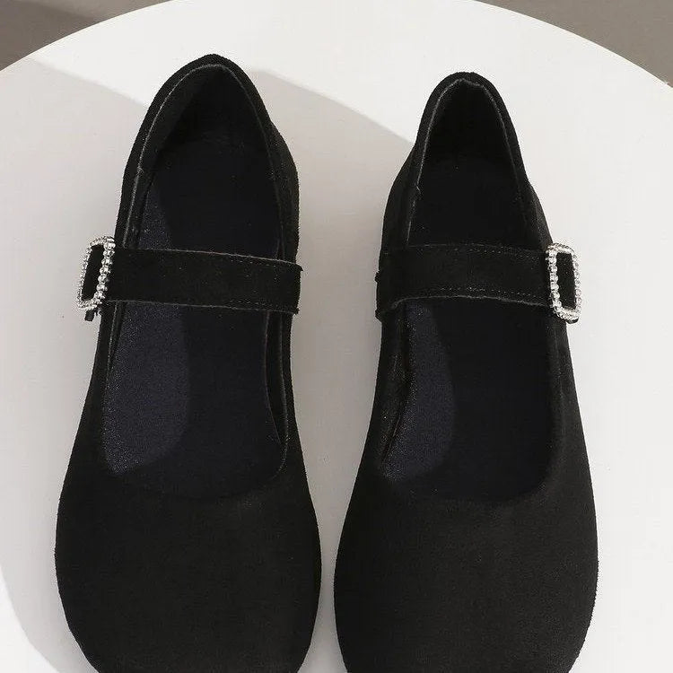 Black canvas women's fisherman shoes with rubber soles shown in low-top casual design