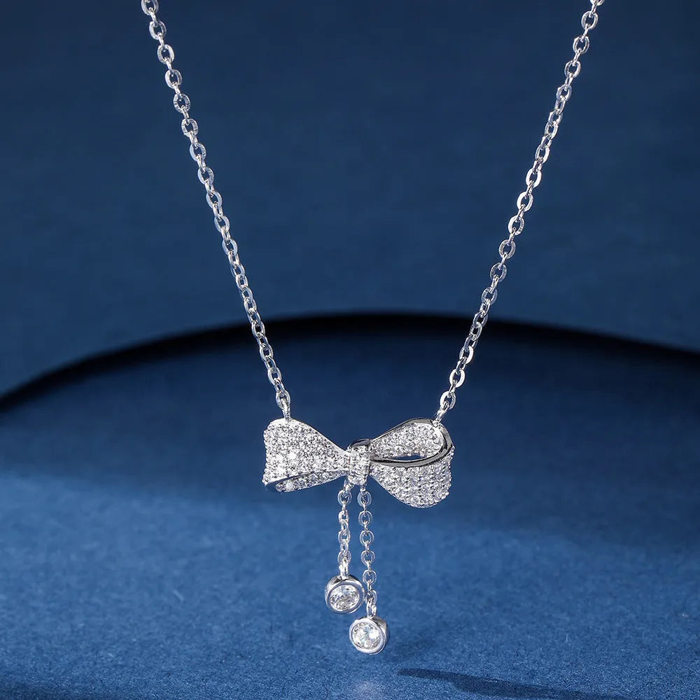 S925 sterling silver bow pendant necklace on O-ring chain, silver colour