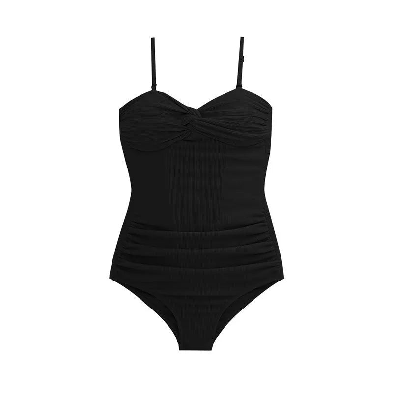Women's black suspender-style one-piece jumpsuit swimsuit on a mannequin, showing the high-waist and sleeveless design.
