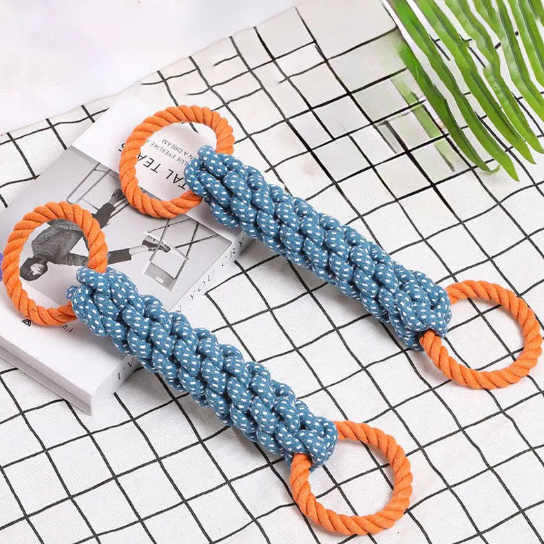 Blue double-ring braided cotton bone dog chew toy for teeth cleaning.