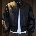 Men's extended length black PU leather jacket with litchi grain texture and light business style