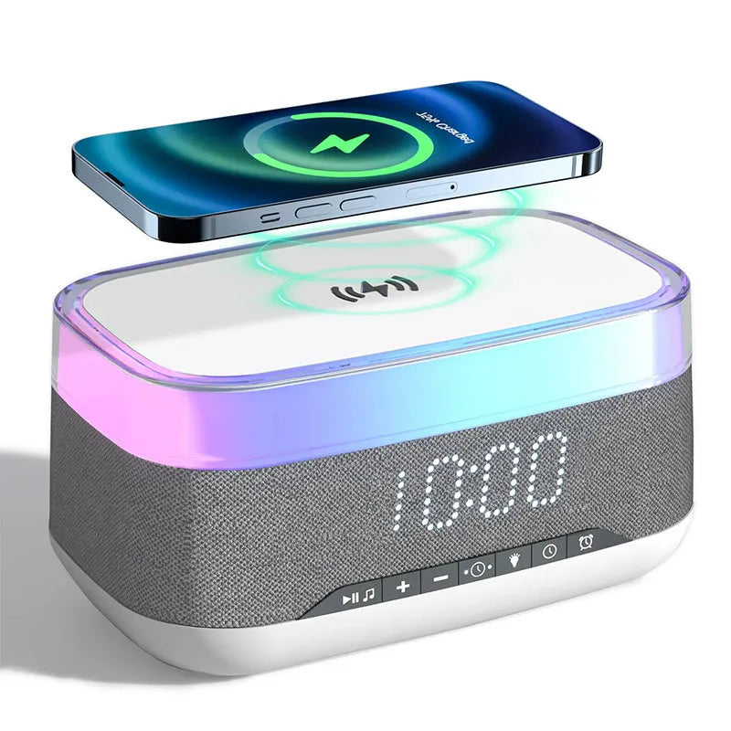 White multifunctional alarm clock with Bluetooth speaker and wireless charging pad on a table