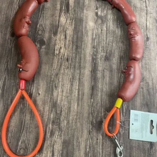Brown sausage toy bundle attached to 108cm rope dog leash with grip tape handle