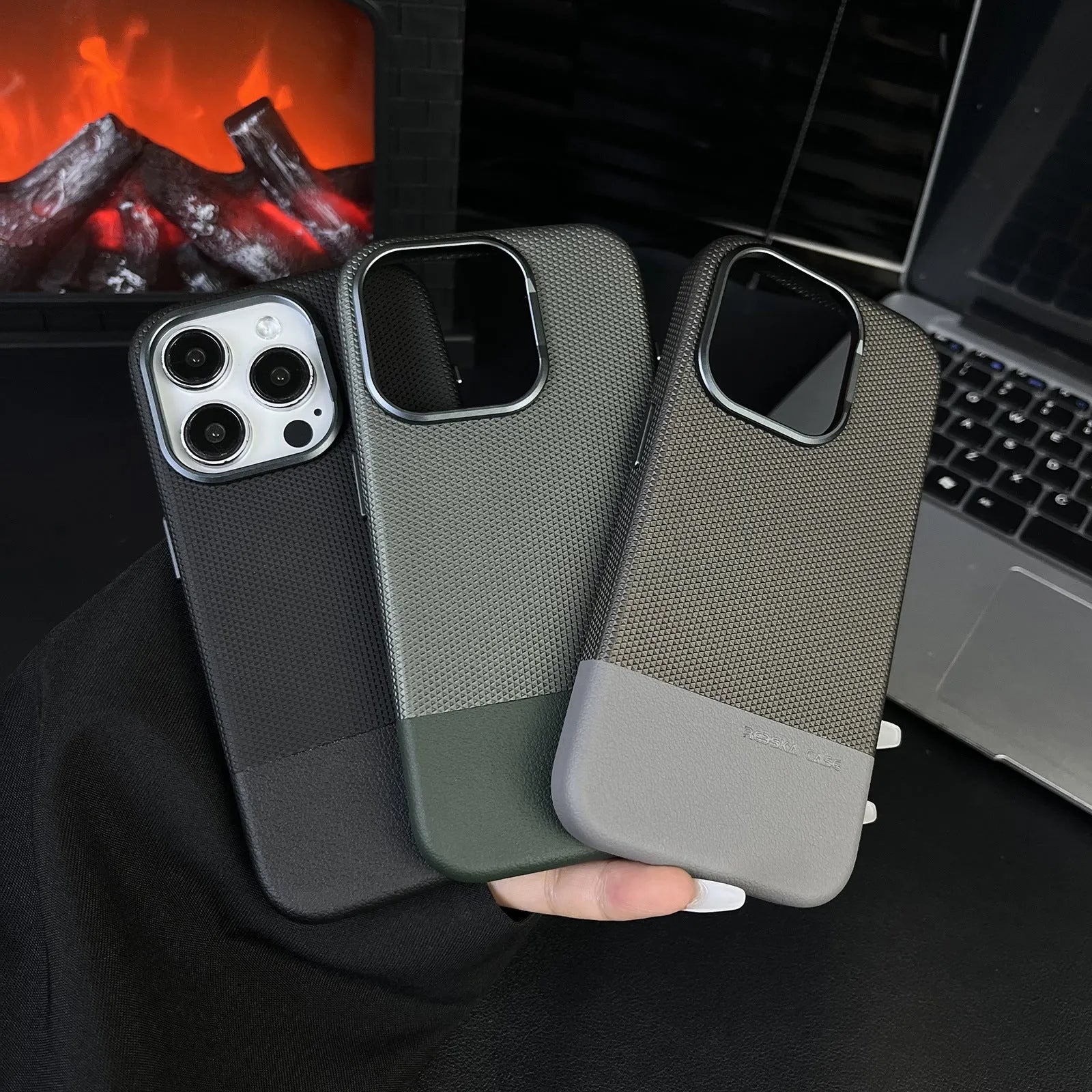 Black iPhone case with dragon scale texture and stitching, showing magnetic all-inclusive shockproof design