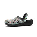 Black women's platform sandals with rhinestone decoration on the EVA upper.
