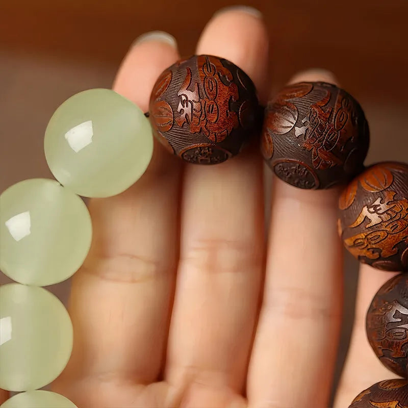 Rosewood bracelet with carved Fu character in amass fortunes colour on flexible 20mm ring