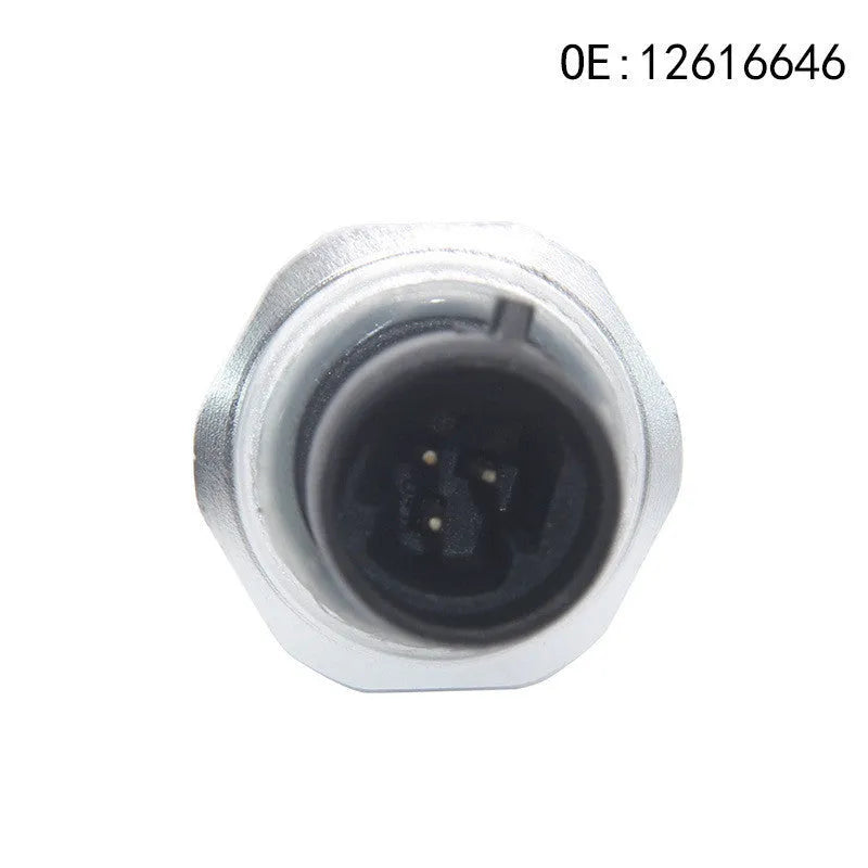 Silver metal fuel pressure sensor for automotive applications with model numbers displayed
