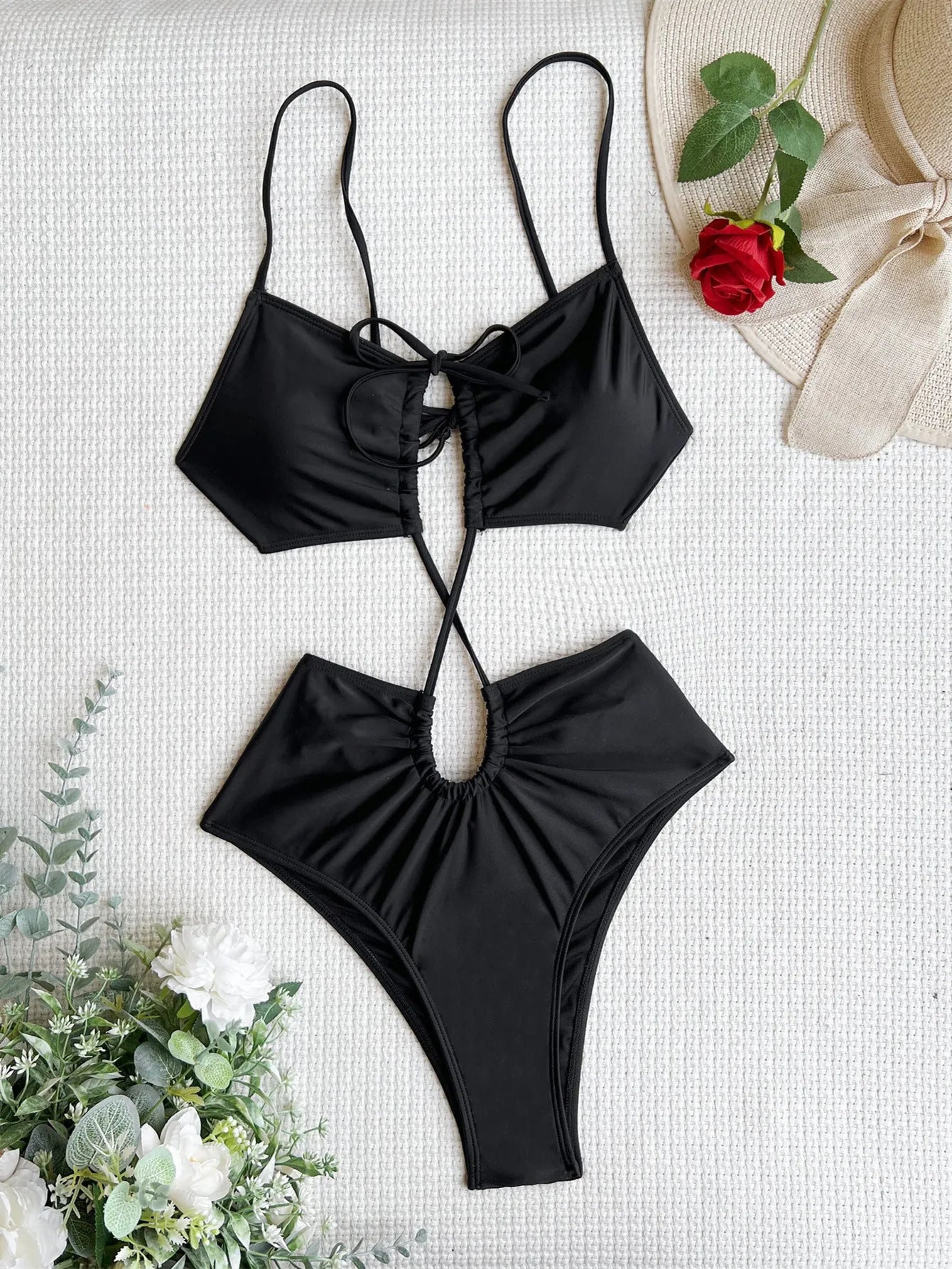 Women's sleeveless one-piece swimsuit with hollow triangle design in black, green, or red