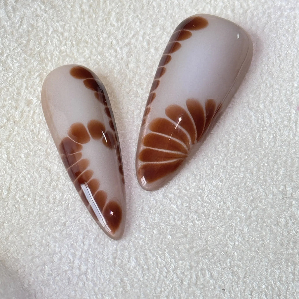 Handmade leopard print, cross and flower pattern acrylic nail stickers in XS, S, M, L sizes.