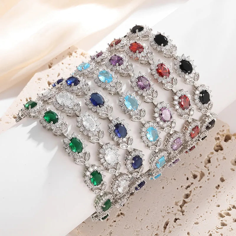 Simple women's alloy bracelet with a single row of inlaid zircon stones in a choice of nine gemstone colours.