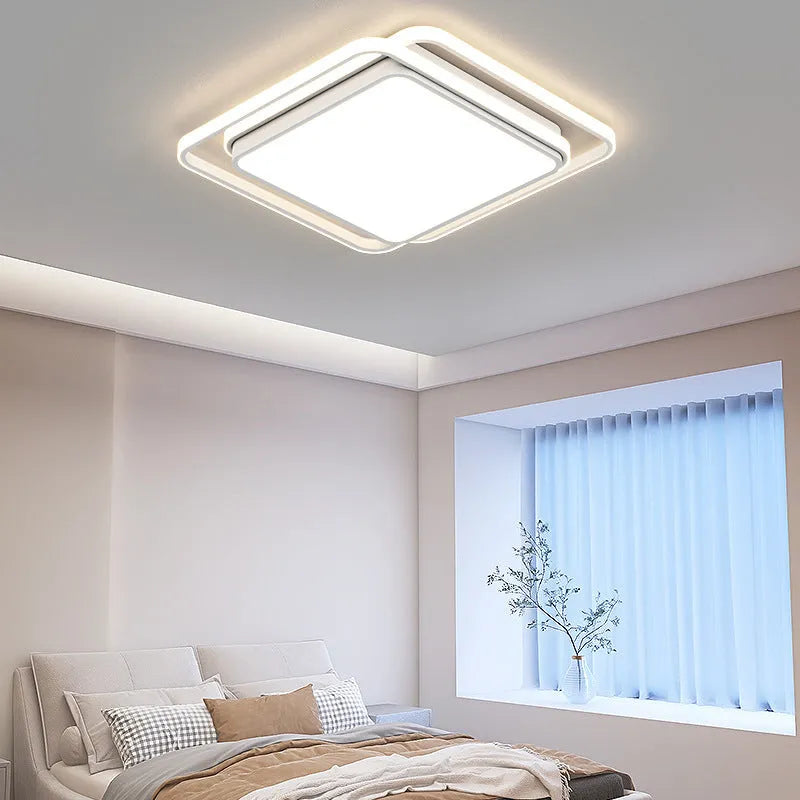 Modern minimalist LED ceiling light with tri-colour dimming in white finish for living room