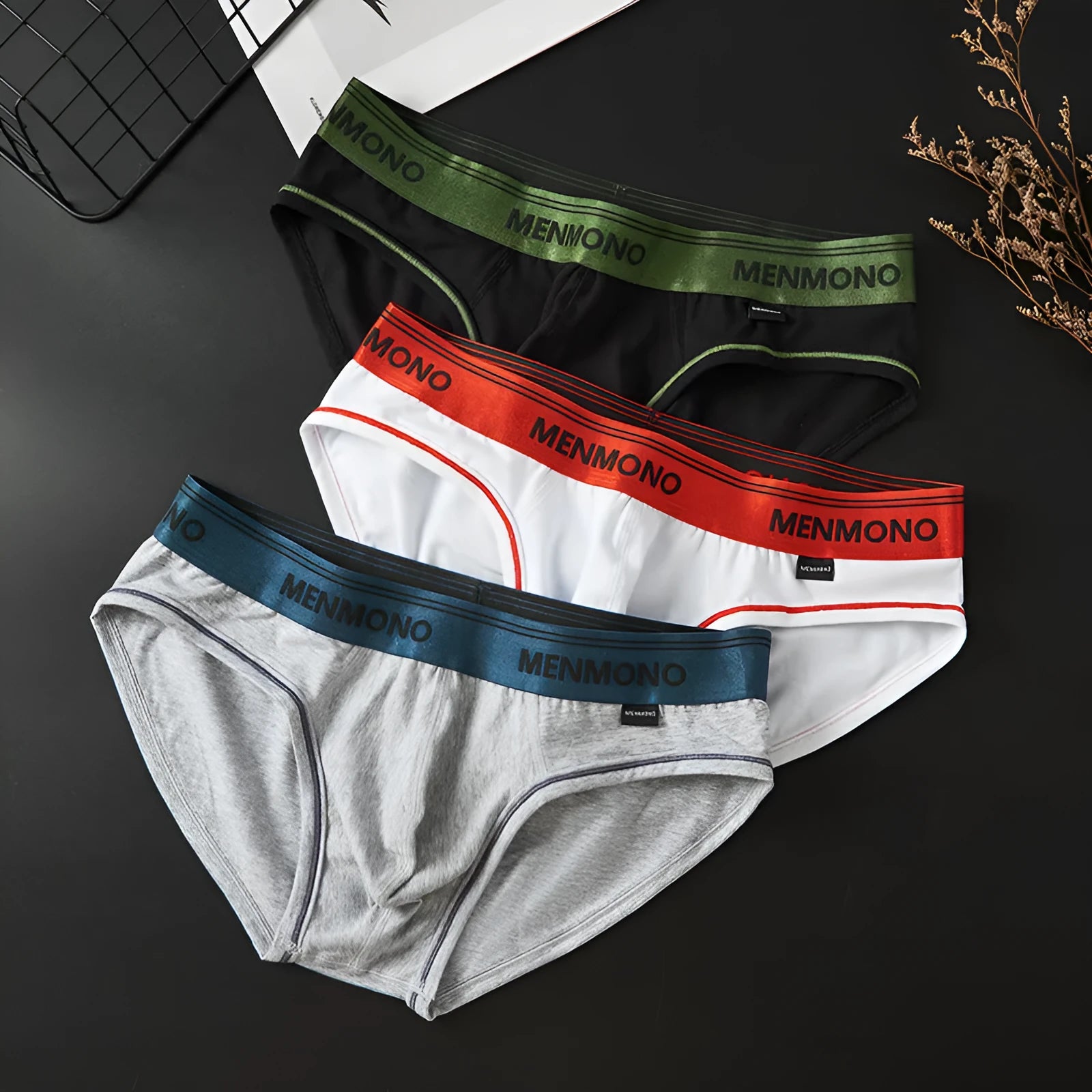 Men's solid colour cotton low waist briefs displayed in a two-tone colour option.