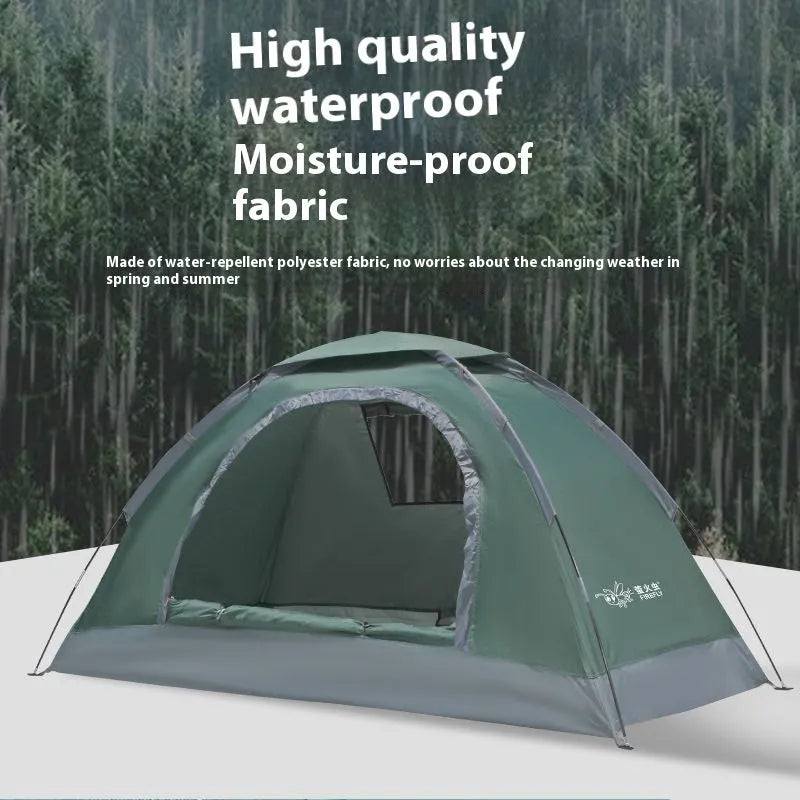 Single-person manual camping tent in army green, set up outdoors with fibre-glass poles.