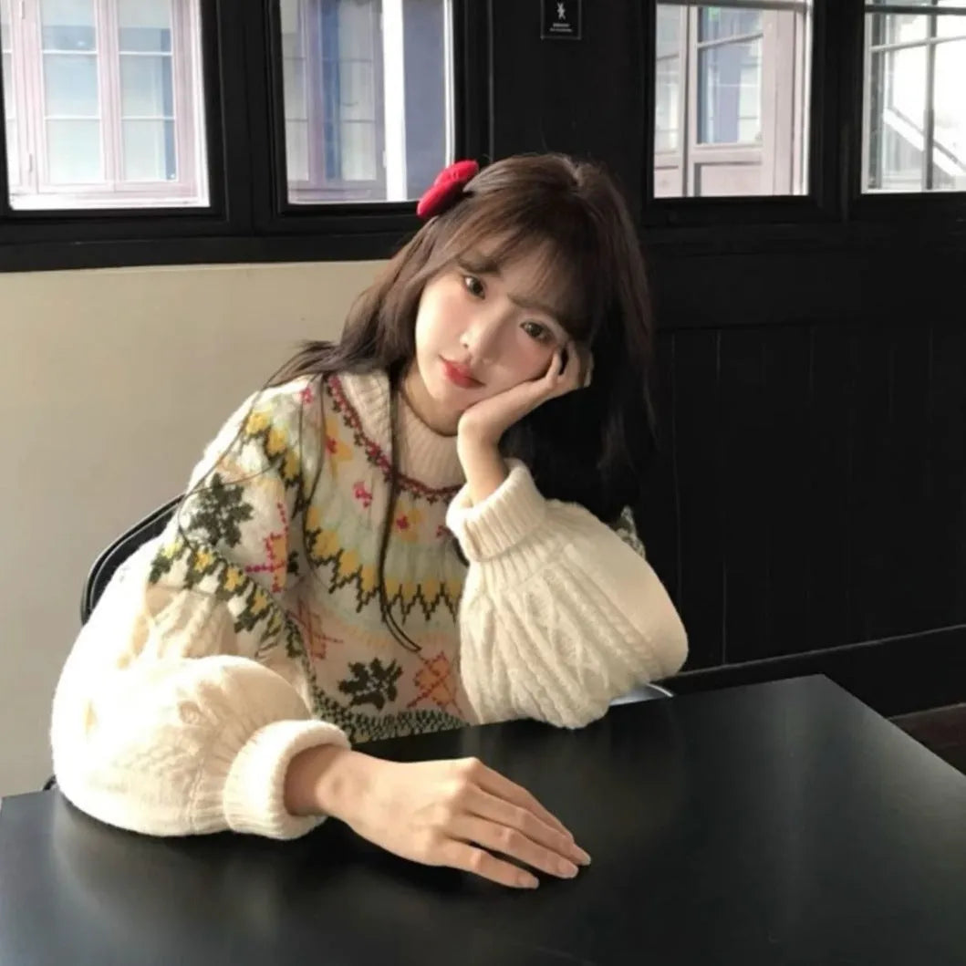 Milky white women's pullover sweater with lantern sleeves and a loose fit.