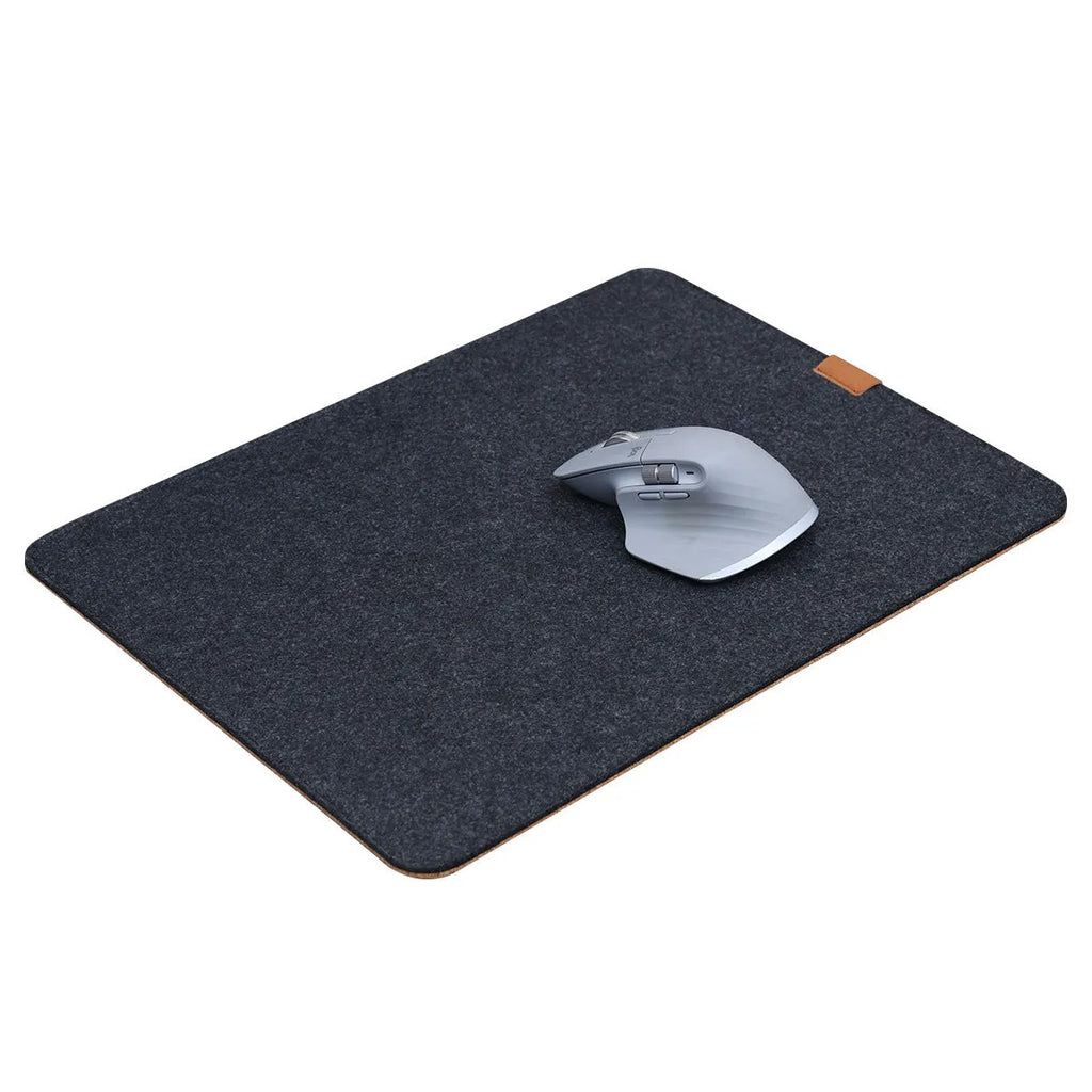 Winter office desk mat in grey felt cork material showing non-slip texture and oversized format