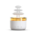 White plastic cloud rain effect USB air humidifier and essential oil diffuser with coloured lights.