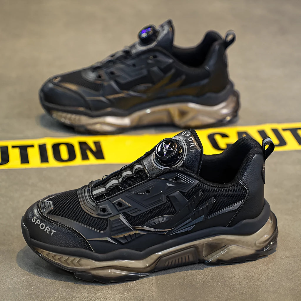 Men's black casual shoes with rotating button fastening and a low platform sole.