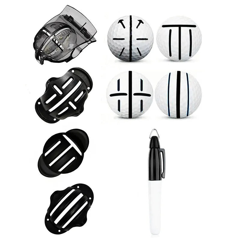 Plastic golf scriber putter alignment tool set with scribers and drawing pens on a green.