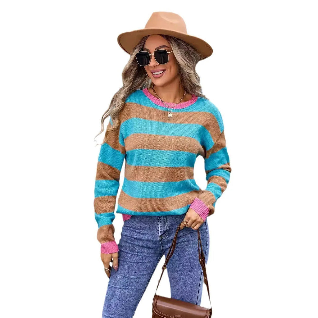 Women's loose fit long sleeve acrylic sweater in striped or plaid pattern