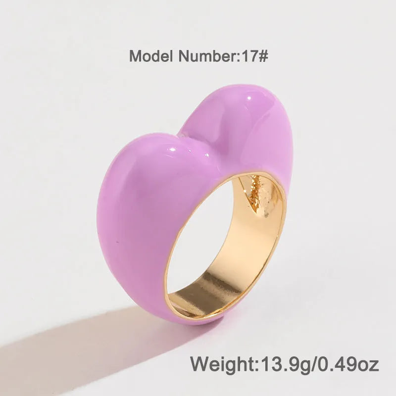 Colourful three-dimensional enamel heart ring on a zinc alloy band.