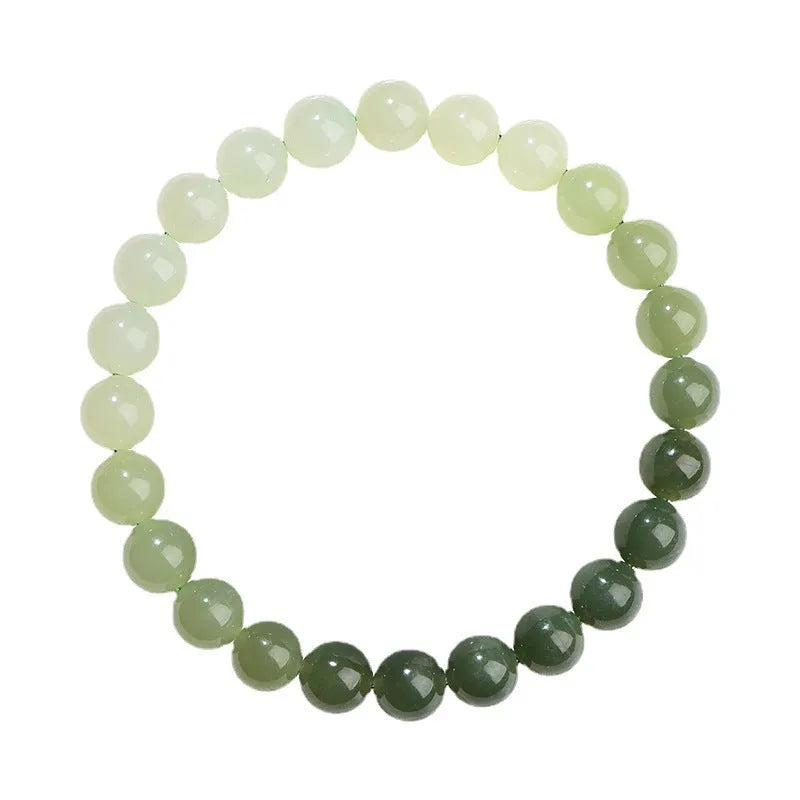 Natural clear water Hetian jade bracelet with gradient colour beads in round or barrel styles.