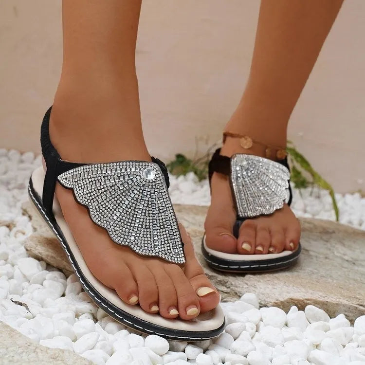 Women's rhinestone shell flip-flop sandals with PU upper and rubber sole in low heel flat slide style
