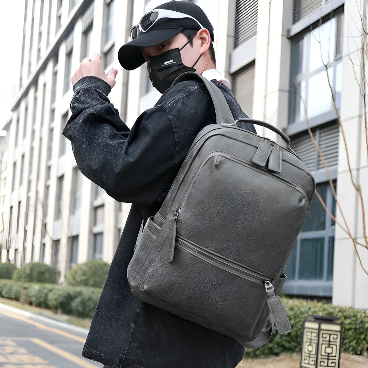 Men's vintage waterproof PU leather backpack in solid colour with retro style, capacity 20-35 litres