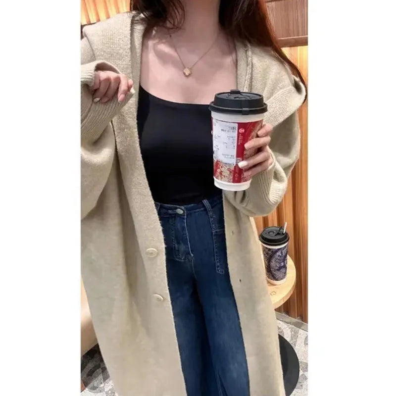 Korean style long hooded cardigan for women in a wool blend fabric, shown in oatmeal colour.