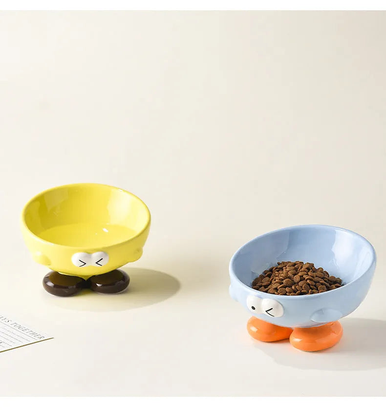 Ceramic slanted pet bowl in blue colour showing oblique design for neck support during feeding